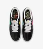 A top-down view of a pair of black Nike Air Force 1 sneakers with colorful accents and a daisy detail on the laces. Produktbild-Vorschau