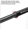 Close-up of a bike dropper post with a sealing ring, highlighting its protective features. Produktbild-Vorschau