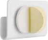 A white wall-mounted smartphone charging holder with a peel-off adhesive backing. Produktbild-Vorschau