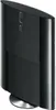 A black PlayStation 3 Super Slim console is shown from a side angle, standing upright on a silver circular base. Produktbild-Vorschau