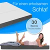A woman is lying on a mattress, with a mattress shown in the background and text overlays. Produktbild-Vorschau
