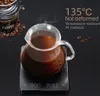 A coffee pour-over carafe filled with coffee, sitting on a digital scale. Coffee beans and a coffee tin are in the background. Produktbild-Vorschau