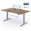 A standing desk with dual monitors, keyboard, and mouse. Anteprima dell’immagine prodotto