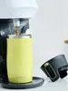 A lime green Contigo travel mug is being filled with coffee from a coffee maker. Anteprima dell’immagine prodotto