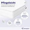A close-up of a white mattress with marketing icons and text describing its features. Produktbild-Vorschau