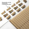 A collection of beige pleat blind accessories and a partially visible pleat blind. Produktbild-Vorschau