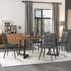 A dining room scene with a table and chairs. Produktbild-Vorschau