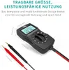 A black battery tester with red and black probes, with dimensions indicated by lines and text overlays. Voir les images du produit