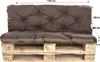 A brown pallet cushion set on a wooden pallet base. Produktbild-Vorschau