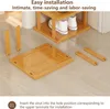 Instructions for assembling a shoe rack with wooden parts laid out on a floor. Produktbild-Vorschau