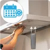 A person is shown replacing a filter in a kitchen range hood. Produktbild-Vorschau