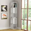 A white corner bookshelf is placed next to a window with a view of trees. Two framed bird pictures hang on the wall next to the bookshelf. Náhled obrázku produktu