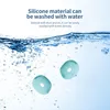 Two light blue silicone earbud tips are submerged in water with bubbles. Voir les images du produit