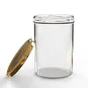 A clear glass jar with a gold lid, shown on a white background. Voir les images du produit