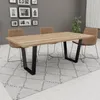 A dining room scene with a wooden table and chairs. Anteprima dell’immagine prodotto