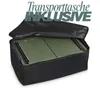 A green camping grill is placed inside a black carrying bag. The bag is partially open, revealing the grill. Text is overlaid on the image. Produktbild-Vorschau