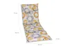 A lounge chair cushion with a yellow and gray circular pattern, shown against a white background with dimensions indicated. Produktbild-Vorschau