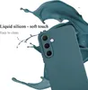A teal smartphone case is shown with liquid teal splashes around it, highlighting its material and ease of cleaning. Produktbild-Vorschau