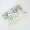 A clear plastic bag containing multiple small green and white circular components, likely vacuum cleaner accessories, with labels and barcodes visible. Náhľad obrázku produktu