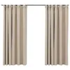 Two beige curtains hanging from a curtain rod against a white background. Voir les images du produit