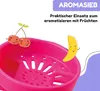 A pink fruit infuser basket with cartoon cherries and a banana illustration. Voir les images du produit