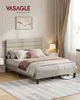 A bedroom scene featuring a bed with bedding, a nightstand with a lamp, and a rug. Produktbild-Vorschau