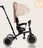 A beige and black Lionelo Tris Plus tricycle is shown against a light beige background. Podgląd zdjęcia produktu