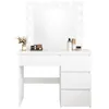 A white vanity table with a lighted mirror and drawers, decorated with makeup and flowers. Náhľad obrázku produktu