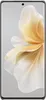 A front view of a silver smartphone with a floral wallpaper. Voir les images du produit