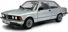 A silver 1980 BMW 323I E21 model car is shown from a three-quarter front angle against a white background. Anteprima dell’immagine prodotto