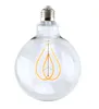 A clear, professional studio shot of a vintage-style LED light bulb against a plain white background. Produktbild-Vorschau