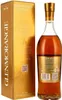 A bottle of Glenmorangie Nectar whisky and its golden packaging. Produktbild-Vorschau