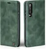 A green flip case for a smartphone, shown from the front and back. Produktbild-Vorschau