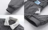 A collage of close-up shots of a gray corduroy jacket with white sherpa lining. Produktbild-Vorschau