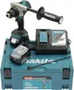 A Makita DHP486RTJ Akku-Schlagbohrschrauber set is displayed on a white background, including the drill, charger, batteries, and storage case. Produktbild-Vorschau