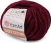 A ball of burgundy yarn with a label. Produktbild-Vorschau
