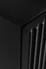 A close-up, abstract shot of a black cabinet with vertical slats. Náhľad obrázku produktu