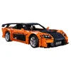 An orange and black toy car model. Anteprima dell’immagine prodotto