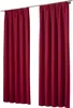 Two red curtains hanging from a curtain rod against a white background. Náhled obrázku produktu
