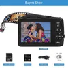A digital camera with a film strip overlay, showing a mother and child on its screen, and accessories below. Produktbild-Vorschau