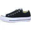 A side view of a black Converse Chuck Taylor All Star Lift Ox sneaker with a white platform sole. Voir les images du produit