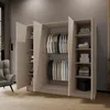 A modern wardrobe with open doors, displaying clothes and folded items on shelves. Produktbild-Vorschau