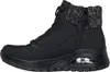 A side view of a black SKECHERS Uno Rugged boot for women. Voir les images du produit