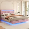 A pink upholstered bed with LED lighting in a bedroom setting. Produktbild-Vorschau
