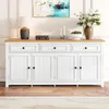 A white sideboard with a wooden top, decorated with a lamp, books, candles, and a vase of flowers. Anteprima dell’immagine prodotto