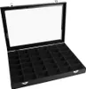 An open black jewelry box with 36 compartments and a clear glass lid. Produktbild-Vorschau