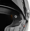 A close-up view of the interior lining and a detail of a helmet. Náhled obrázku produktu