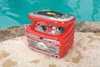 An inflatable cooler shaped like a boombox sits by the edge of a swimming pool. Produktbild-Vorschau