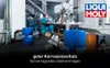 A workshop or factory setting with industrial machinery and blue barrels, featuring a prominent LIQUI MOLY logo and German text. Produktbild-Vorschau