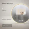 A circular LED bathroom mirror with a gold frame, showing condensation and a heating element graphic. Produktbild-Vorschau